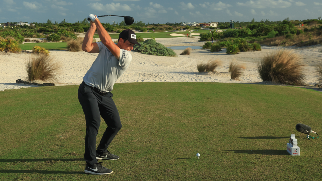 Viktor Hovland of Norway plays his tee shot on the 16th hole with a driver during the final round of the 2022 Hero World Challenge at Albany Golf Course on December 04, 2022 in Nassau, Bahamas. (Photo by David Cannon/Getty Images)