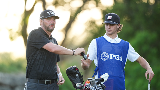 Michael Block and his son on the eighth hole during the second round of the 54th PGA Professional Championship.