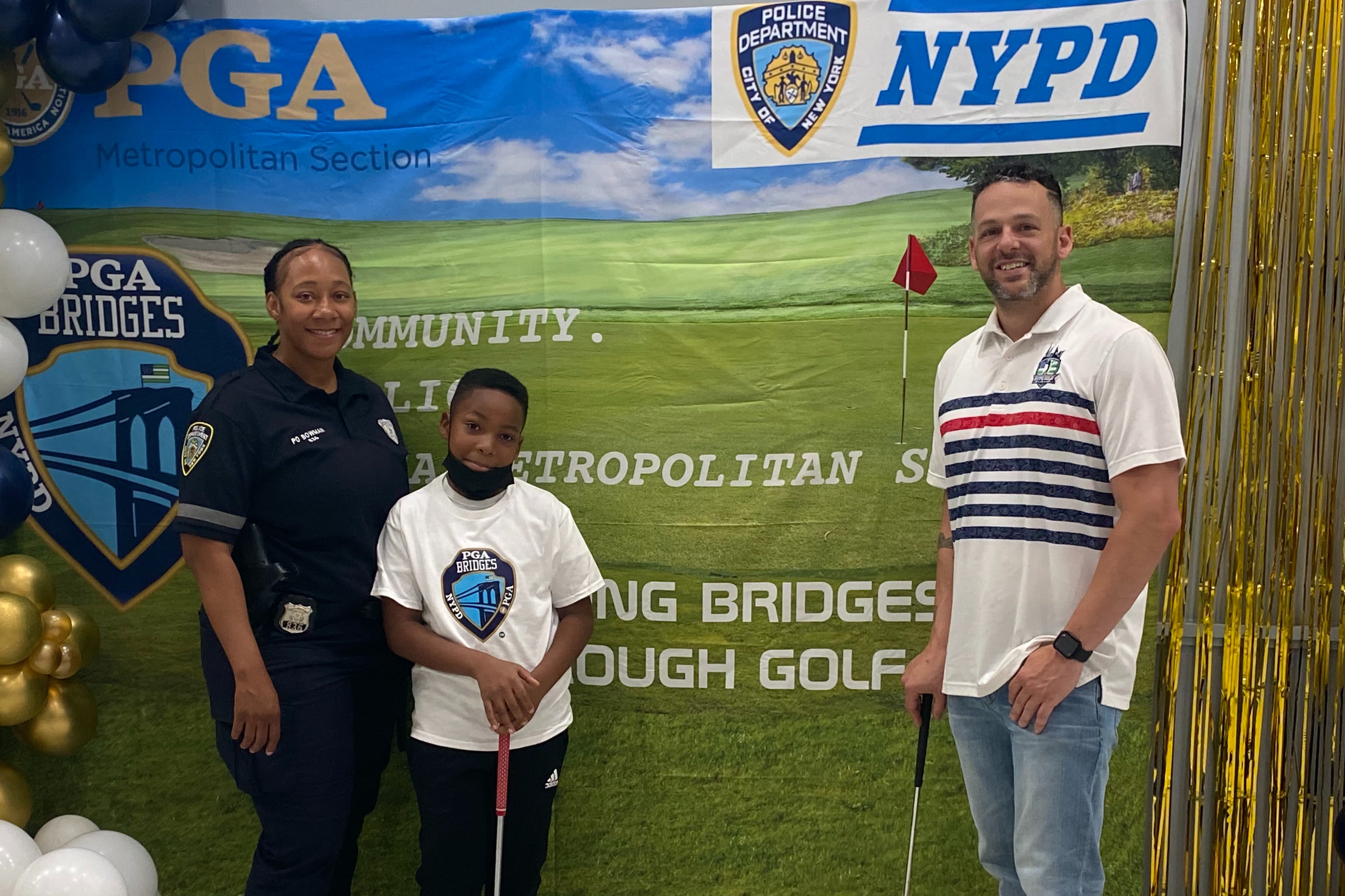 Rallo and a fellow NYPD officer at a PGA Bridges event.