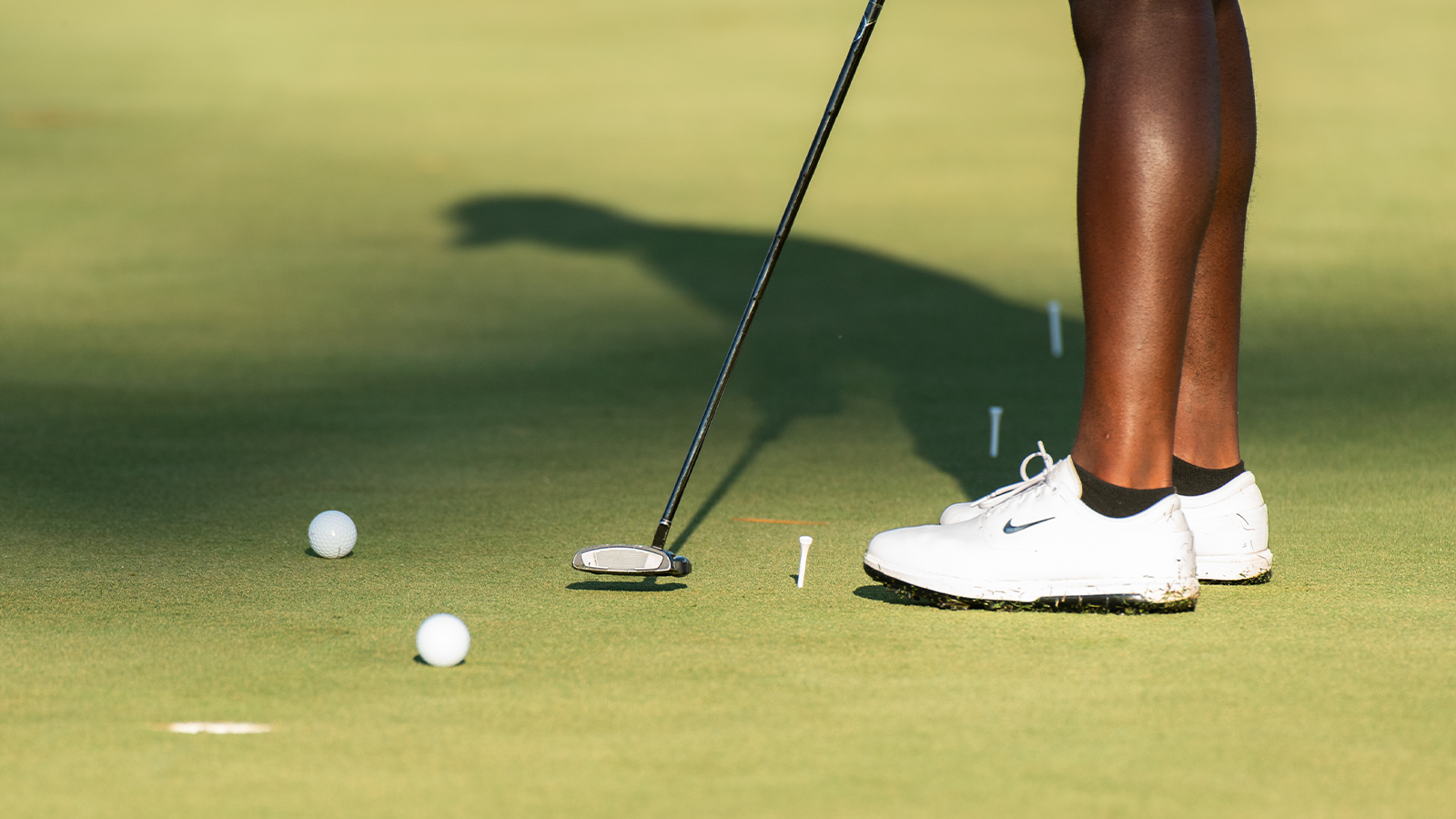 A contestant makes her putt on the practice greens during the third round of the 2021 PGA WORKS Collegiate Championship held at TPC Sawgrass on May 5, 2021 in Ponte Vedra Beach, Florida. (Photo by Montana Pritchard/PGA of America)