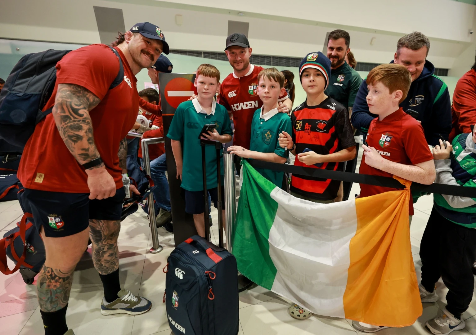Andrew Porter posing with fans