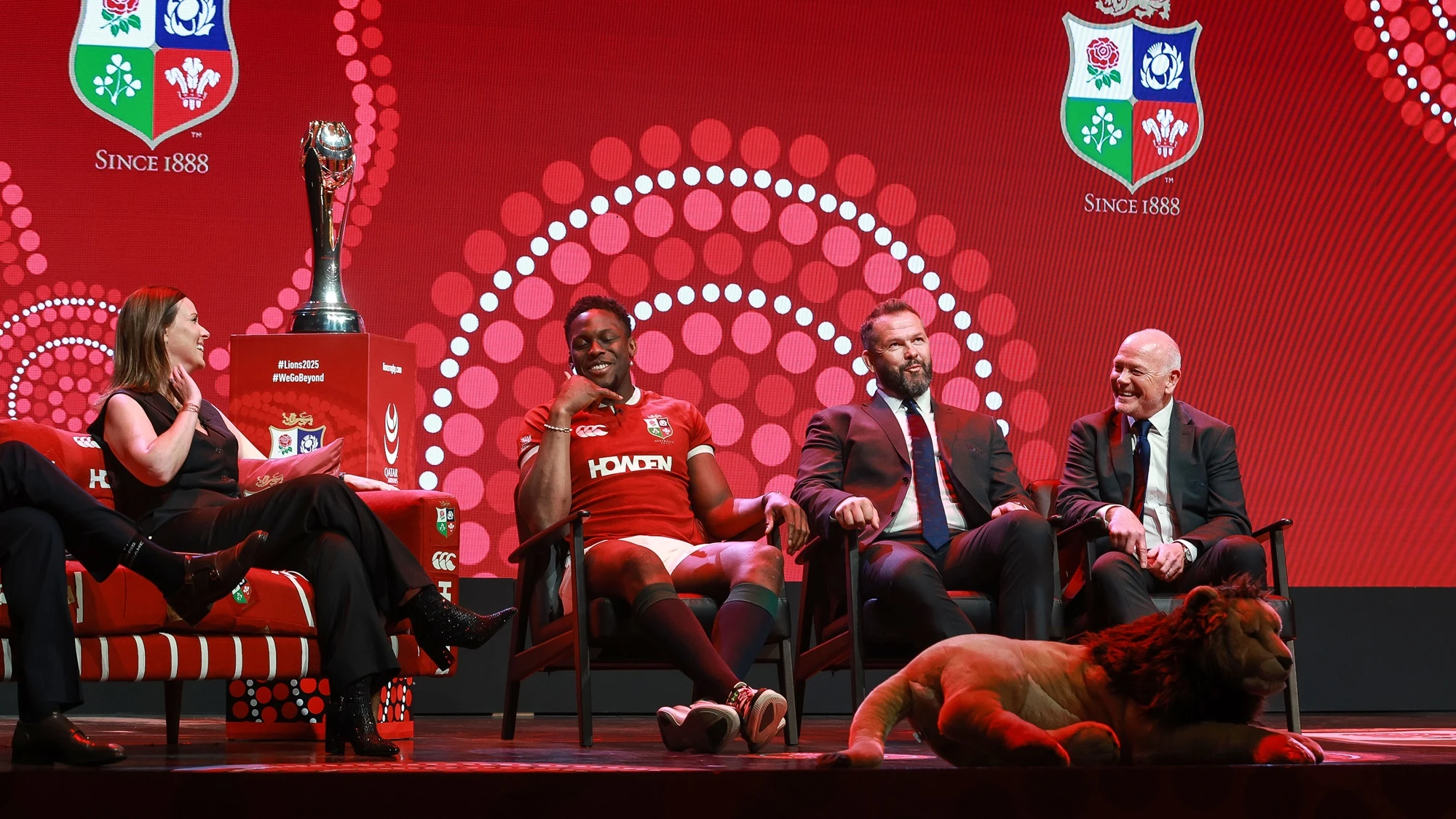 Maro Itoje, Andy Farrell and Ieuan Evans on stage