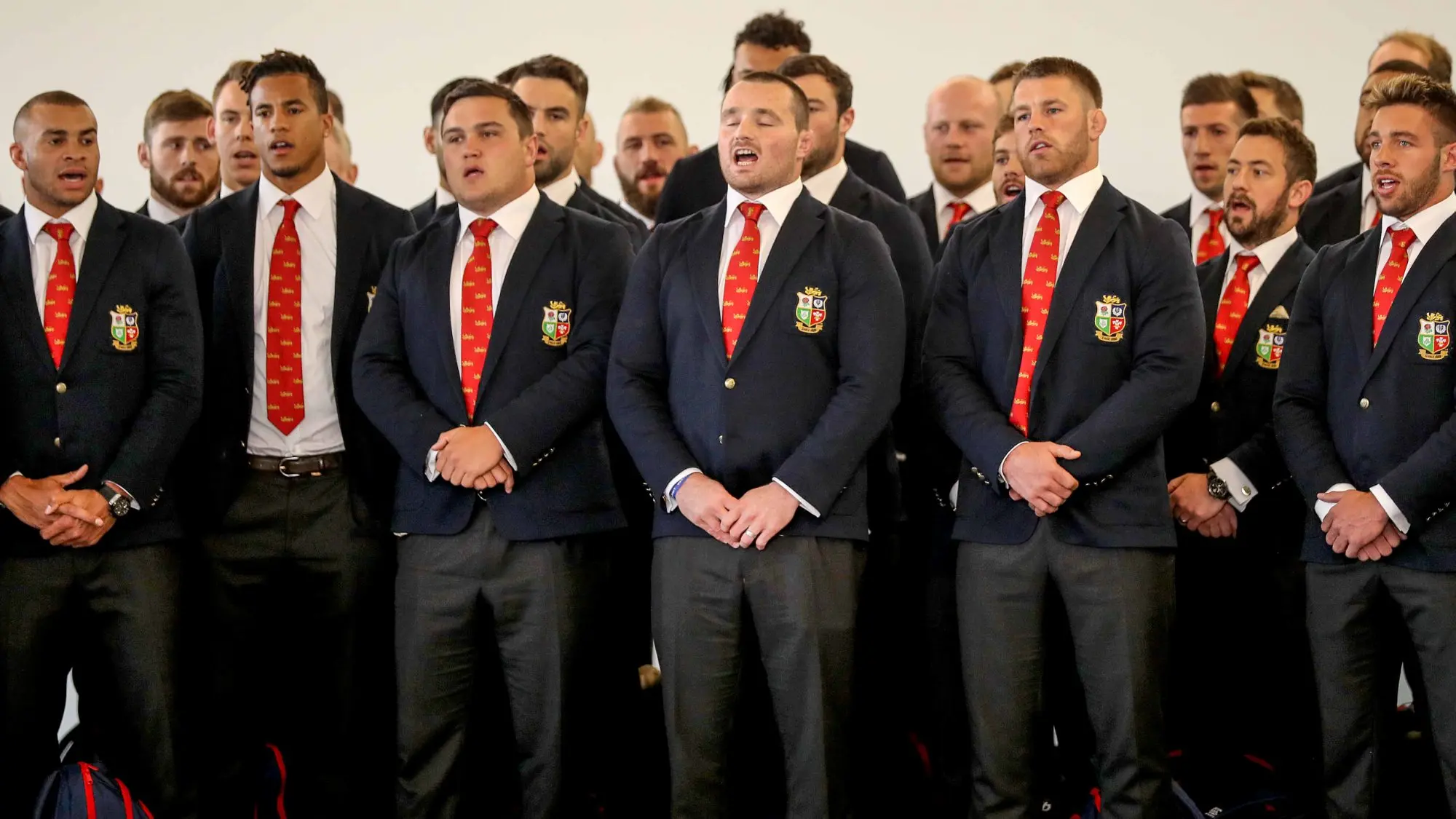 Video: The squad perform Calon Lân on arrival in Auckland