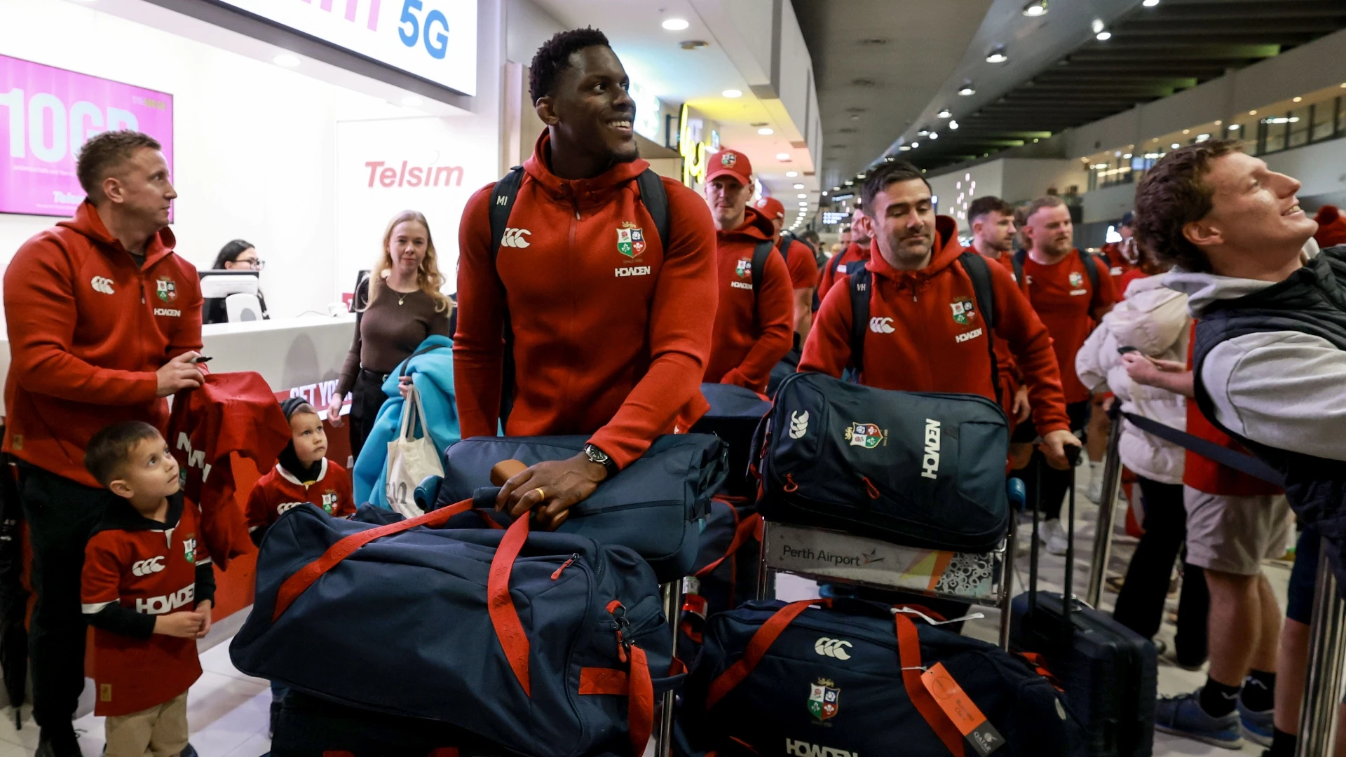 Maro Itoje at the airport