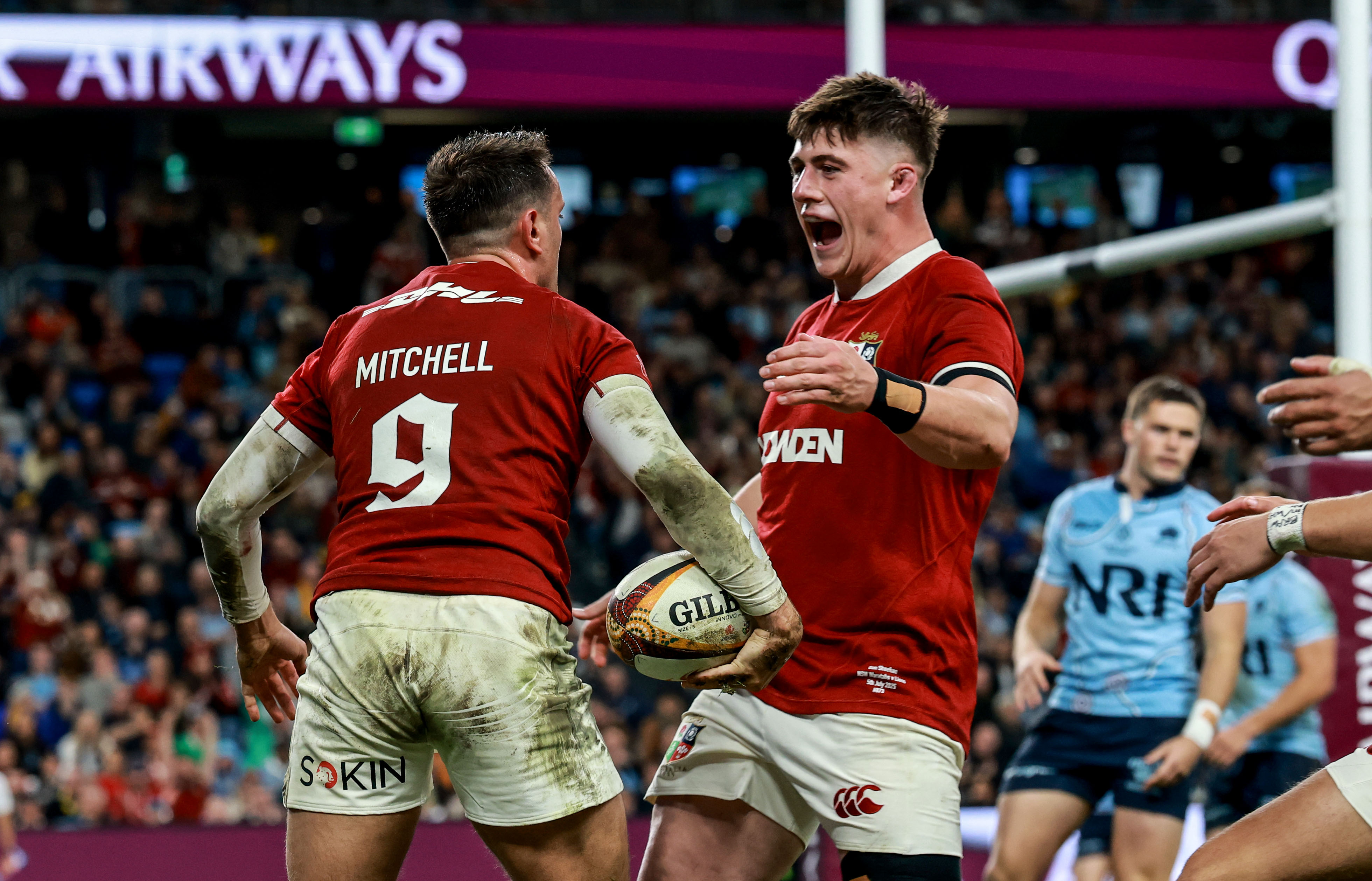 Alex Mitchell celebrates his try with Dan Sheehan