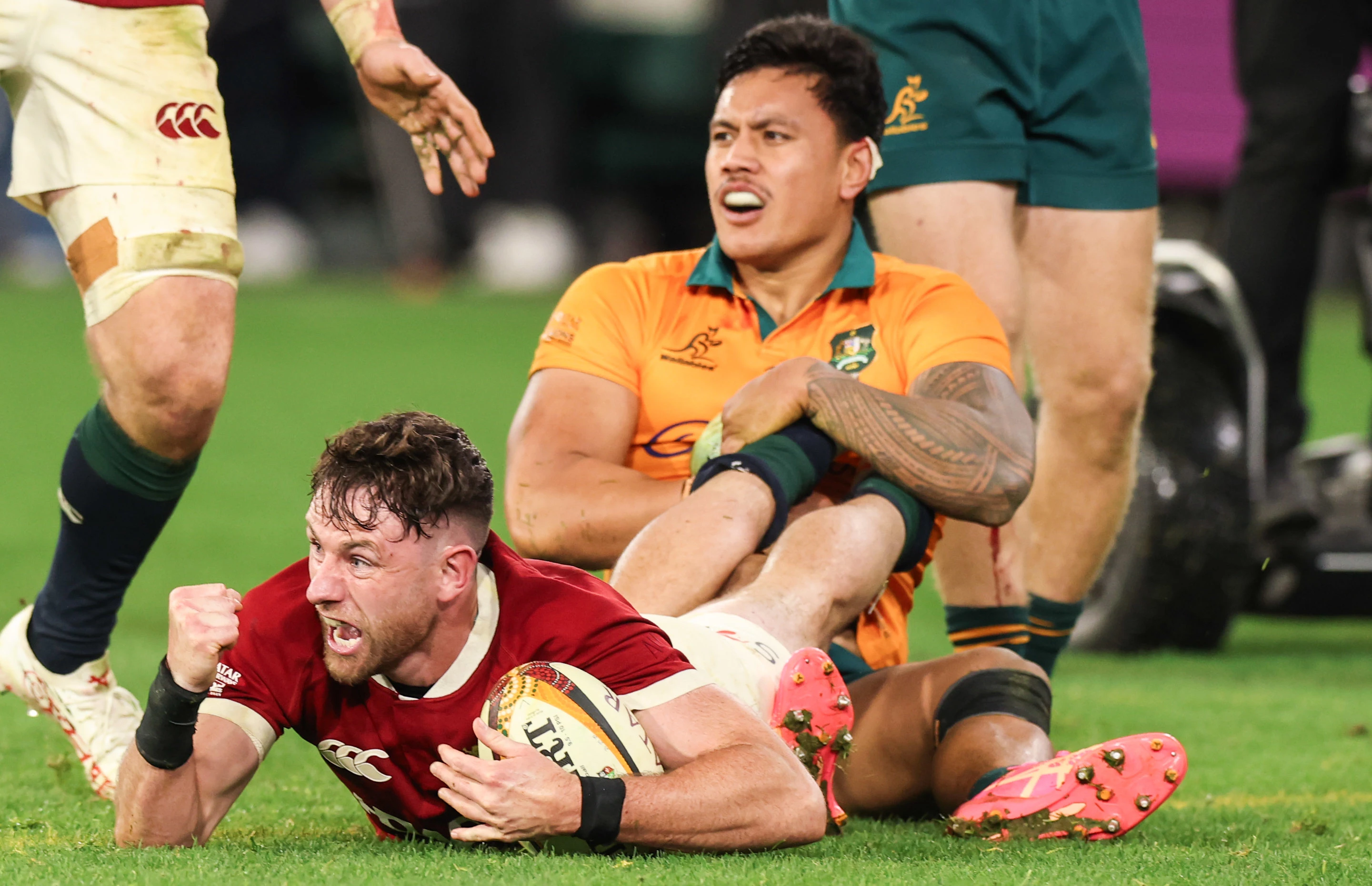Hugo Keenan scores the series-sealing try against Australia at the MCG