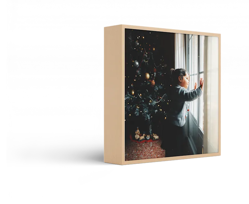 Standing ArtBox with frame color Natural maple against a white background.