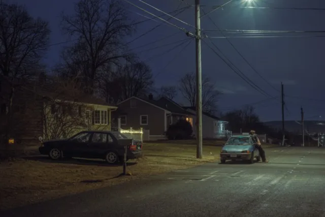  neighbourhood streets at night, with cars, street light.