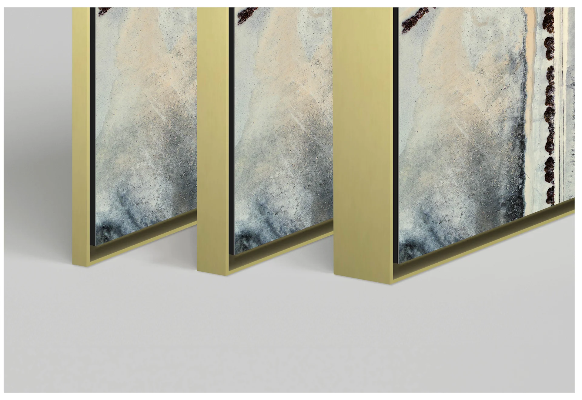 Picture of a framed Tom Hegen photo from the Salt Series, framed in a golden WhiteWall ArtBox aluminum frame