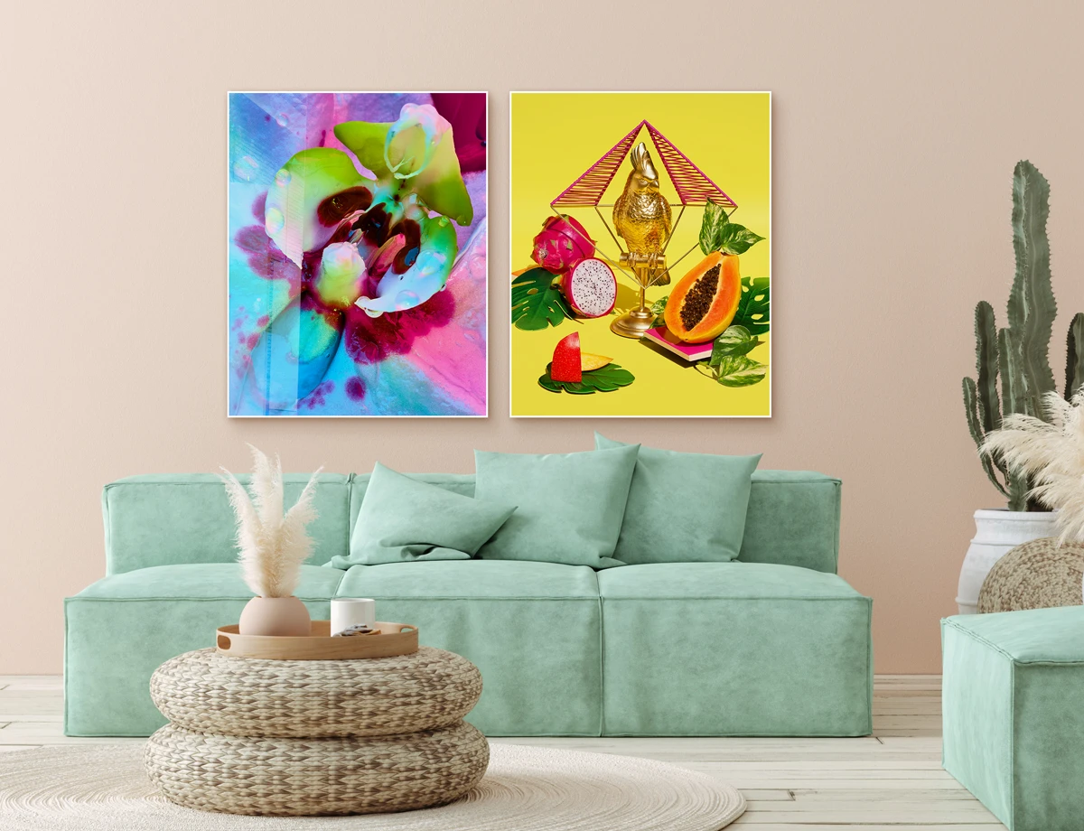 two still lifes of fruit and flowers hanging as prints on a wall.