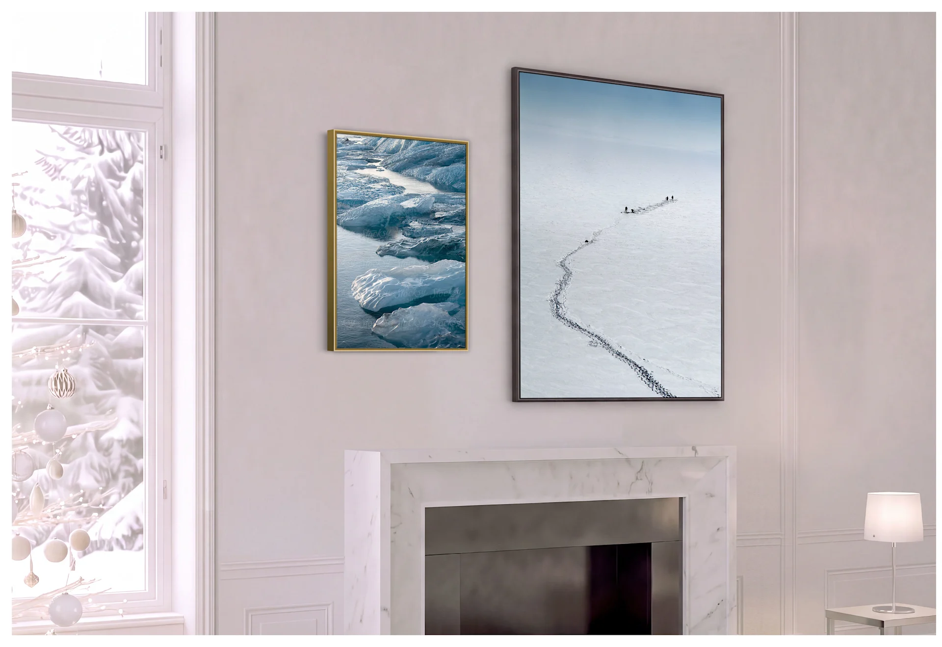 A framed print of a snow-covered mountain peak hangs on a white wall above a white sideboard in a bright living room.