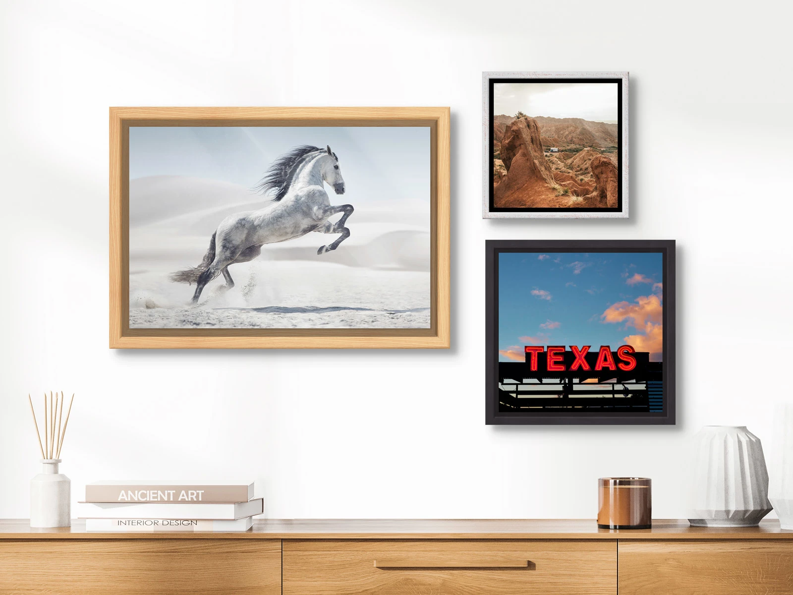 Three images framed in a Floater Frame on a wall in a living room.
