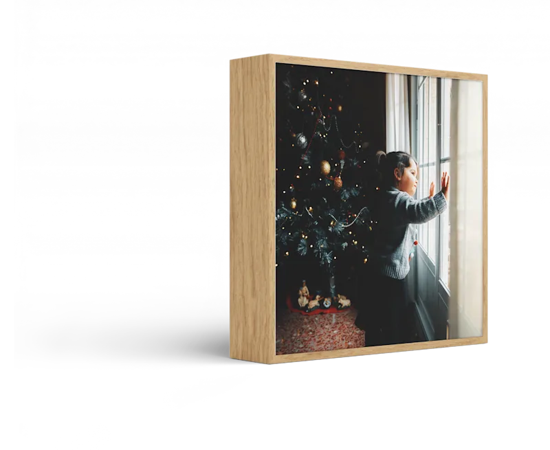 Standing ArtBox with frame color Natural oak against a white background.