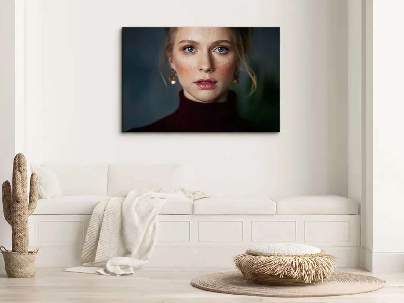 Portrait of a womas as a textile print on a stretcher frame hanging on a wall.