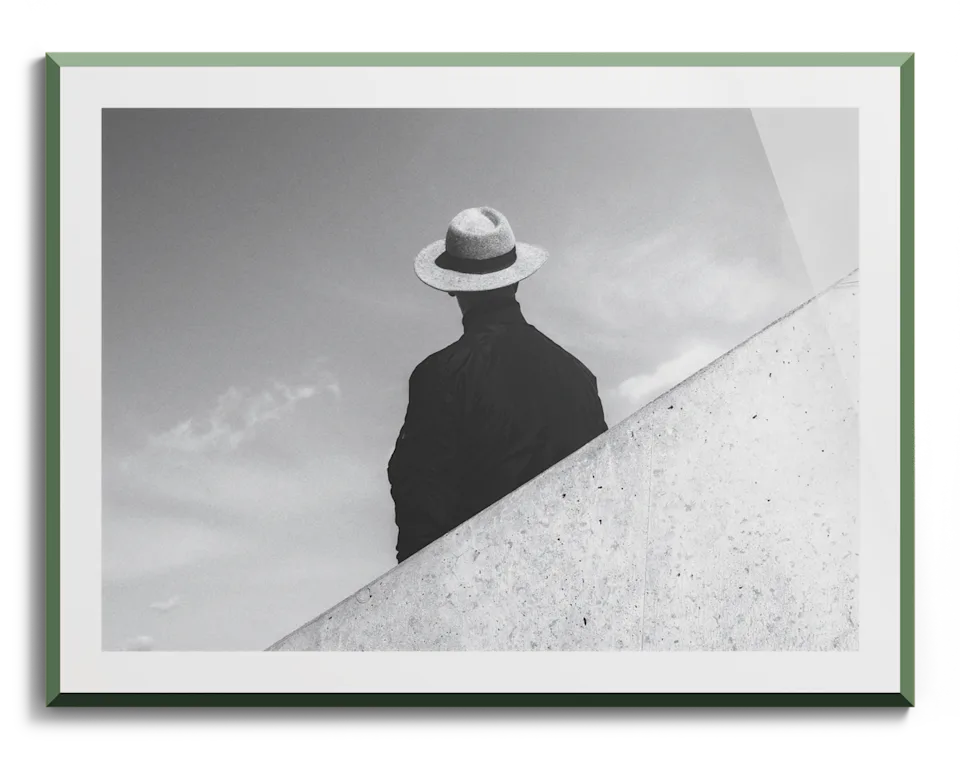 Frontal view of a design edition frame in green.