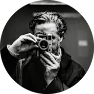 Black and white self portrait of photographer Ruediger Glatz