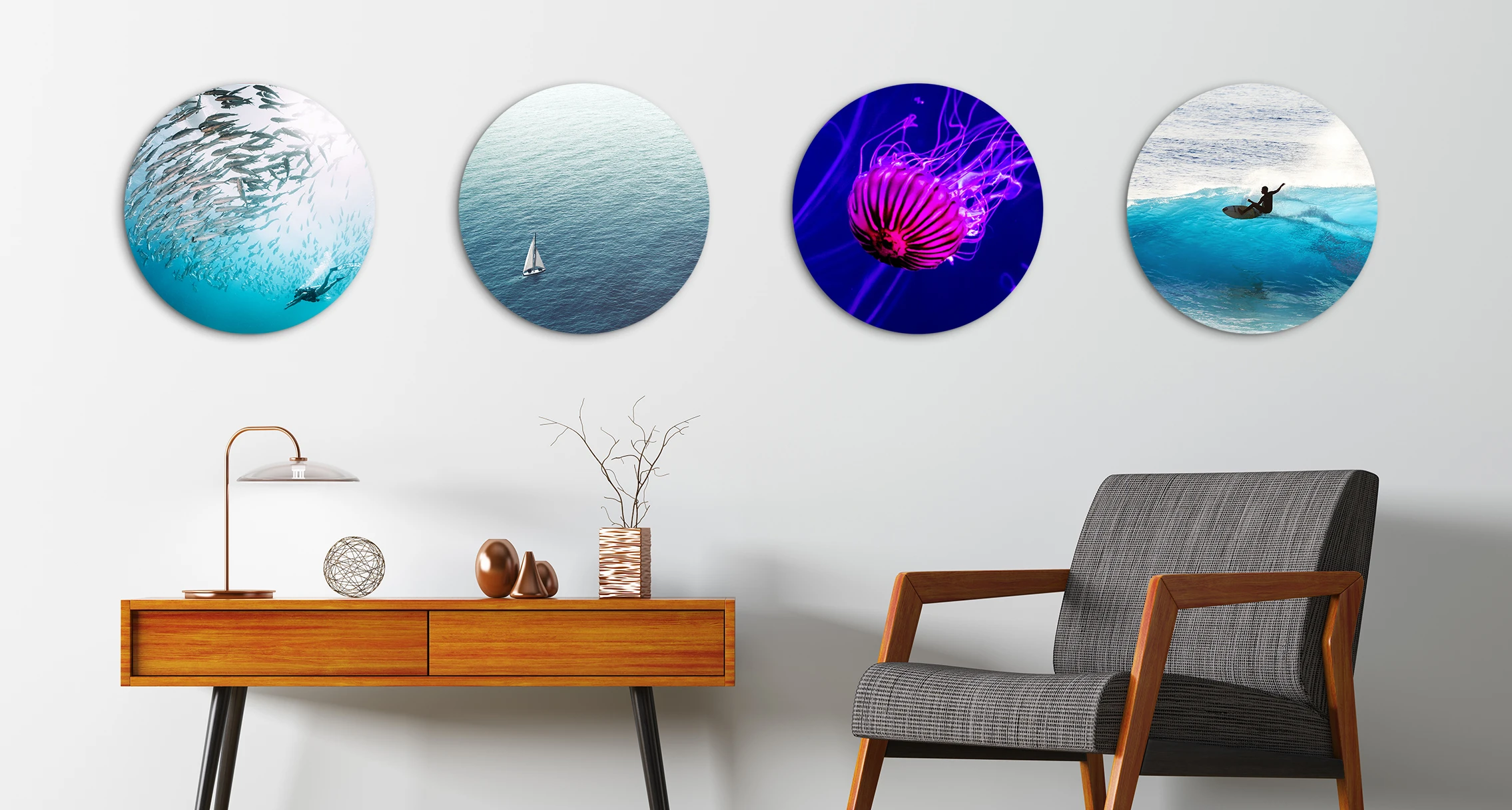 4 different round pictures with maritime motifs are hung next to each other on a wall. 