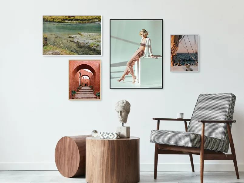 Several different motifs on Acrylic Prints With Slimline Cases on a wall in a living room.