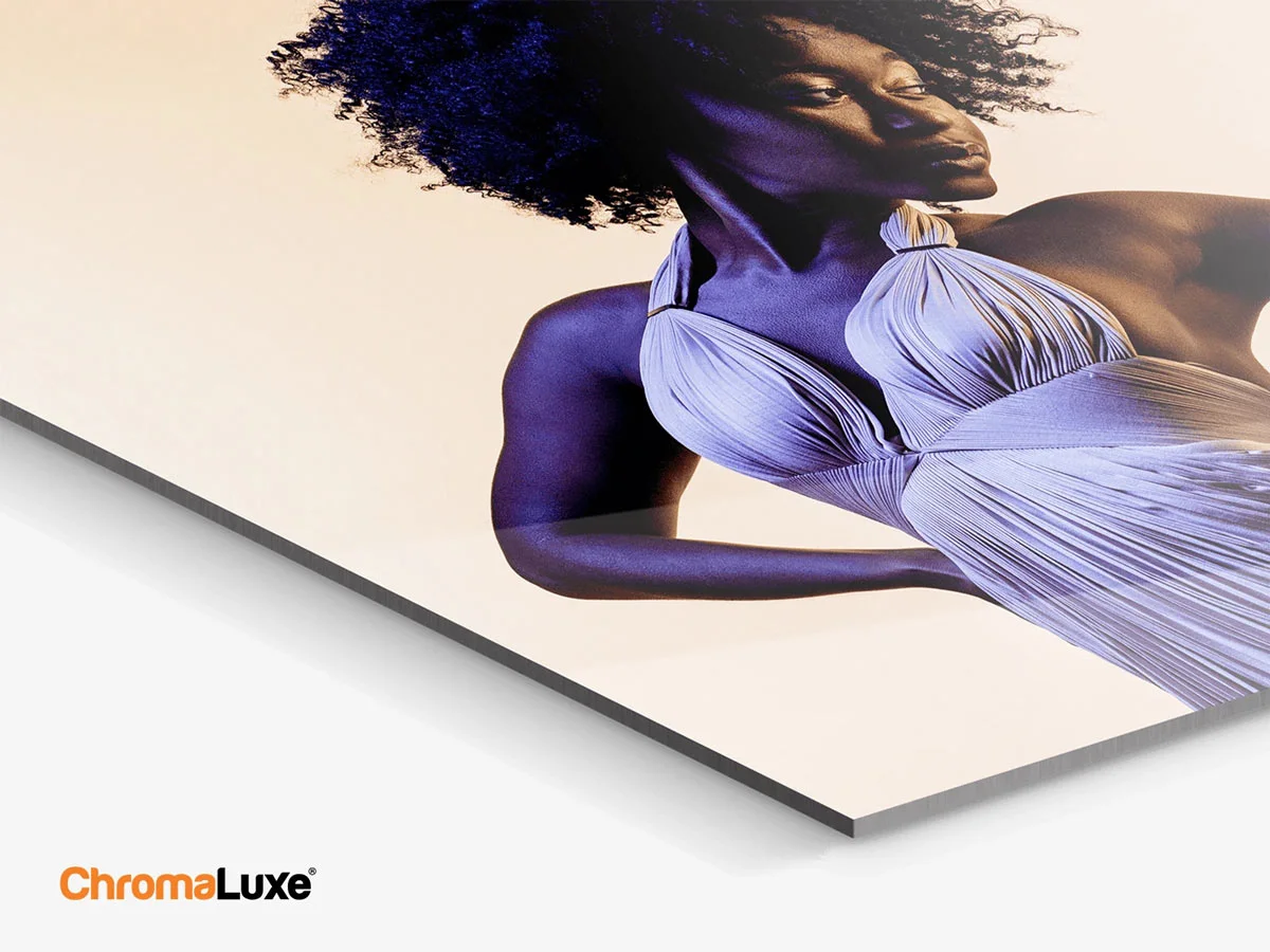 A ChromaLuxe HD Metal Print with a picture of a woman in a purple dress looking slightly to the side on a light background.