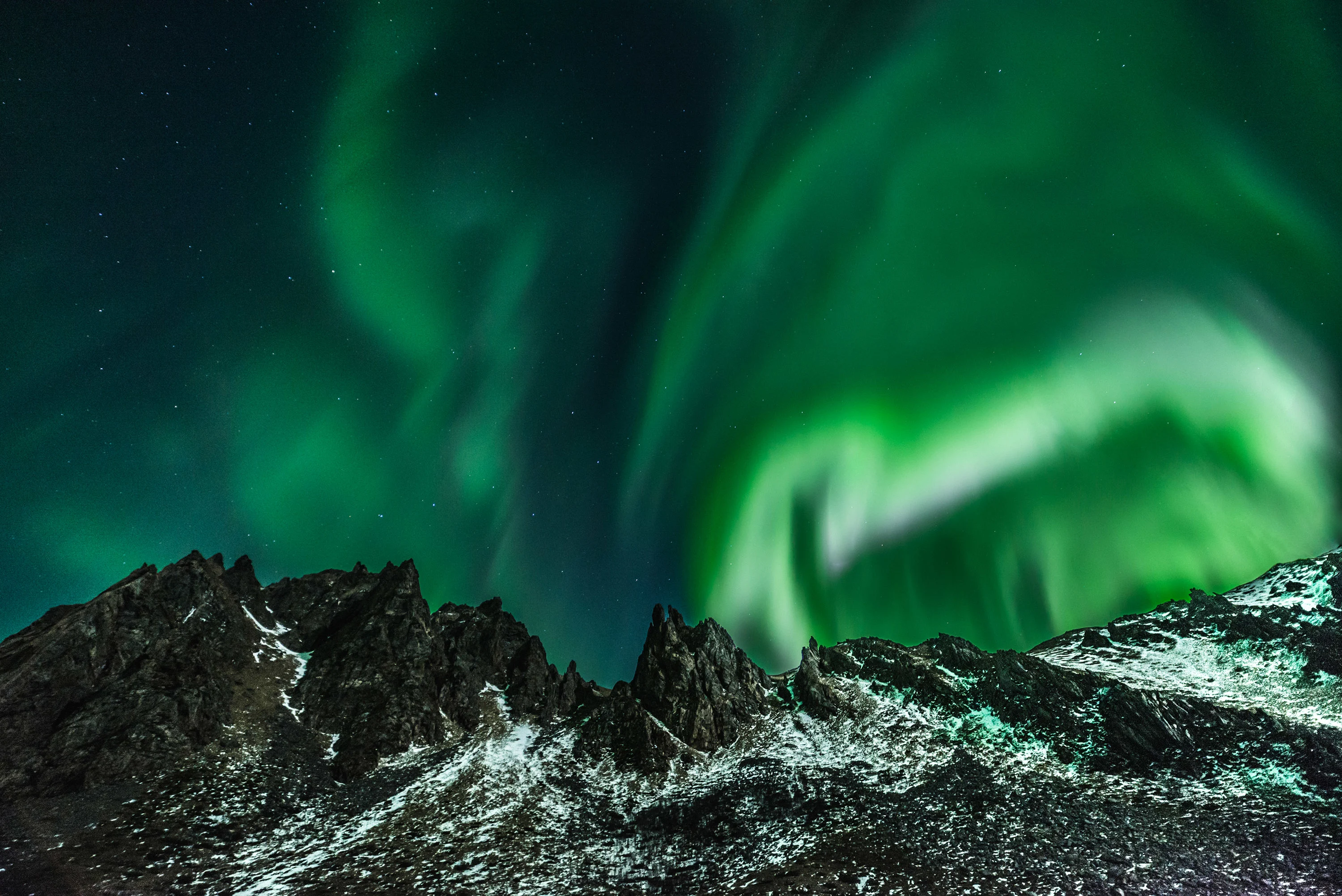 polar lights above a mountain landscape.