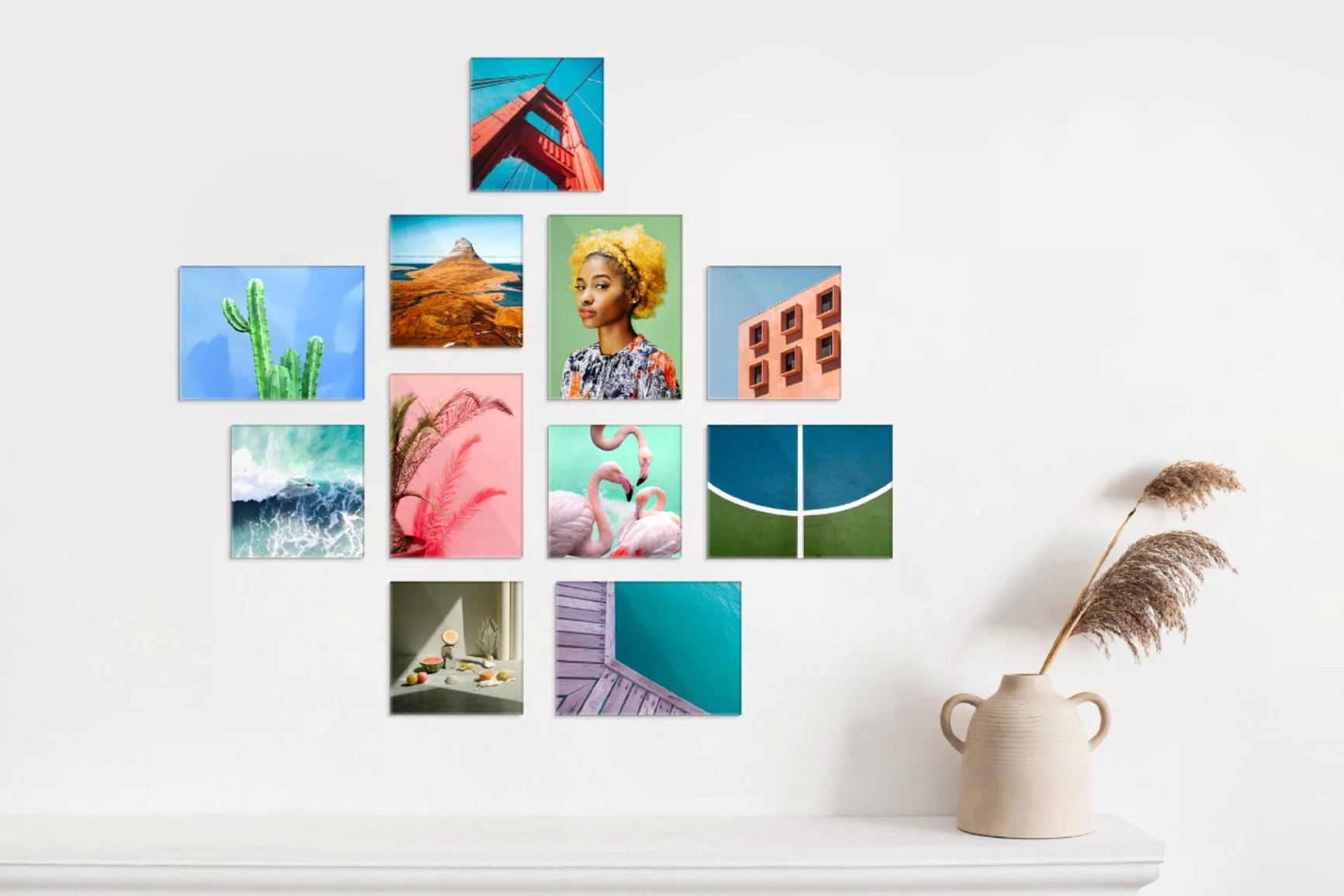 Parete con una composizione di undici WhiteWall-Mini con motivi diversi.