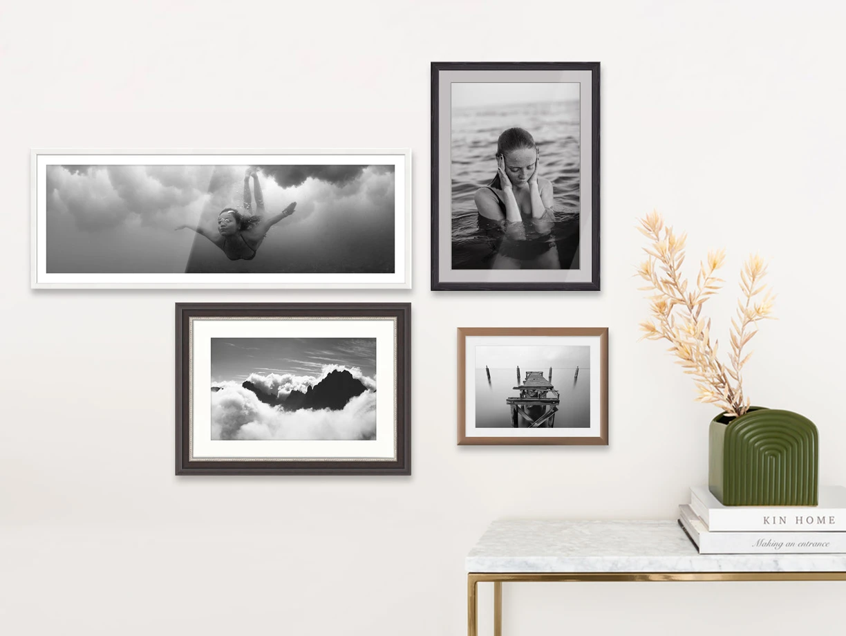 several LightJet prints on Ilford Baryta paper in frames hanging on a wall.