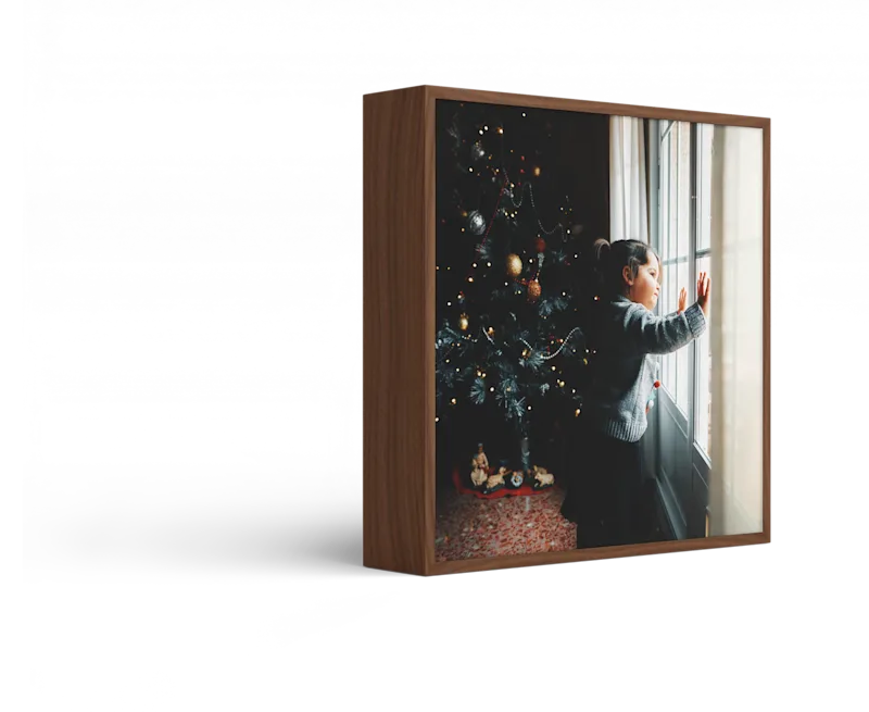 Standing ArtBox with frame color Walnut against a white background.