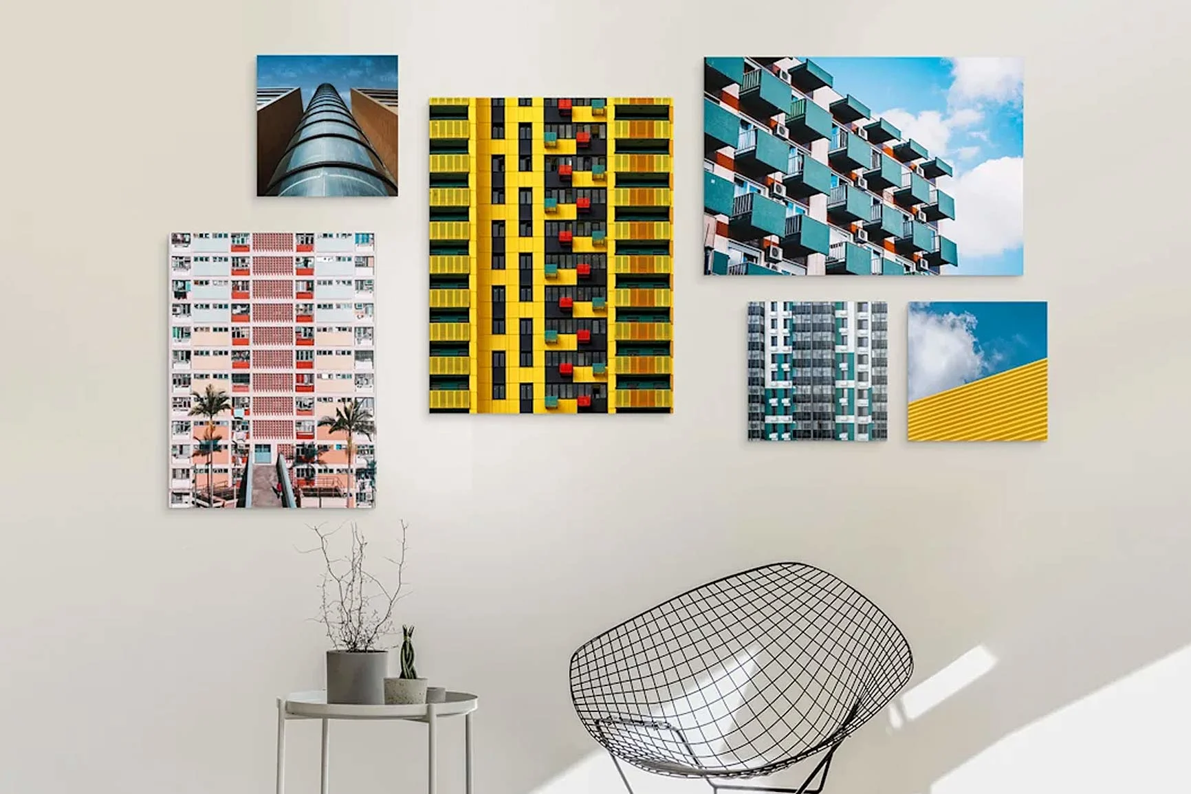 Wand mit sechs Fotos von modernen Gebäudefassaden in verschiedenen Farben und Mustern, darunter gelb, rot und blau.