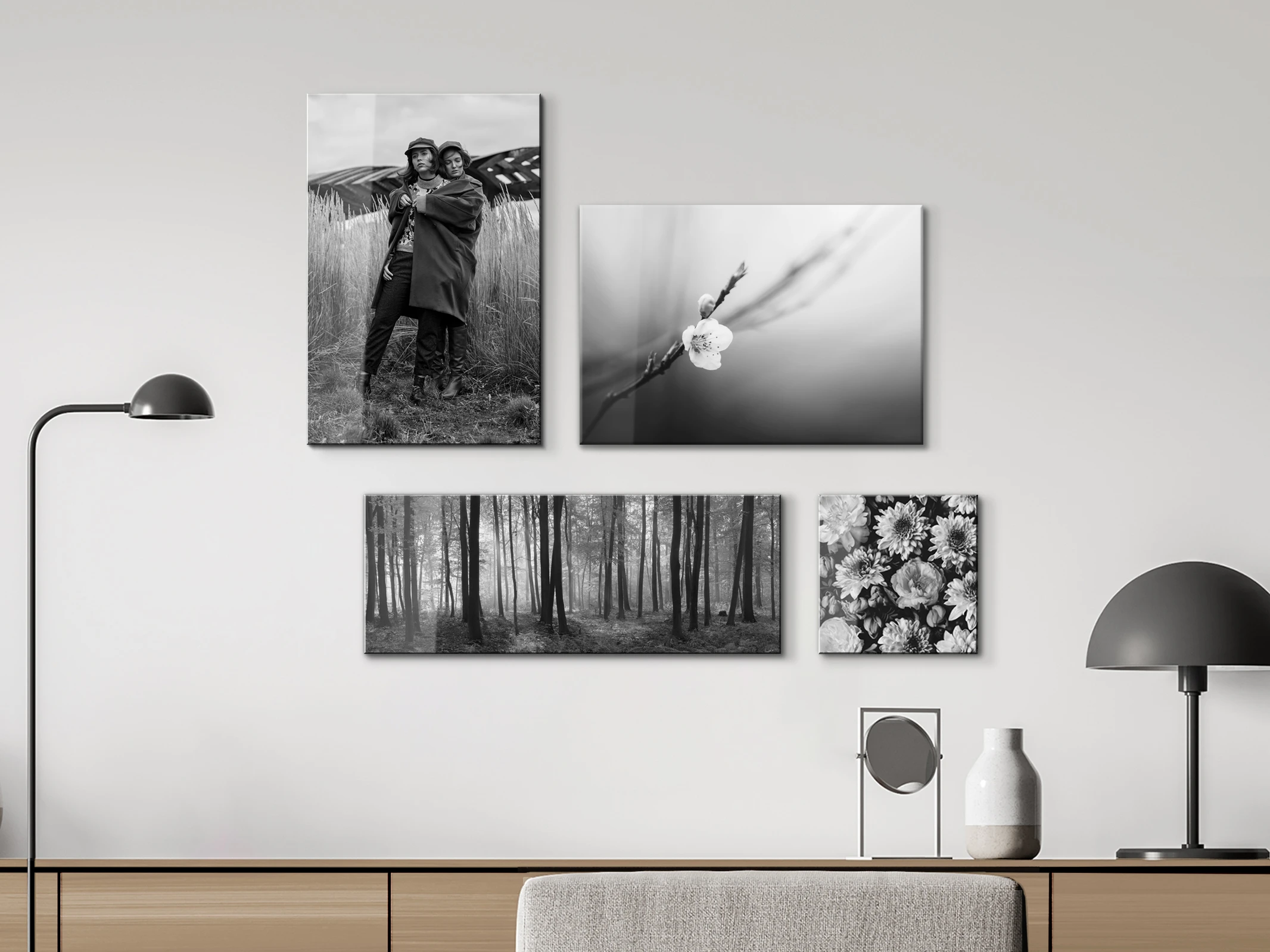 hanging with four black white acrylic prints in different formats.