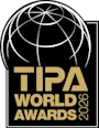 TIPA World Awards 2026 logo with golden lettering and stylized globe.