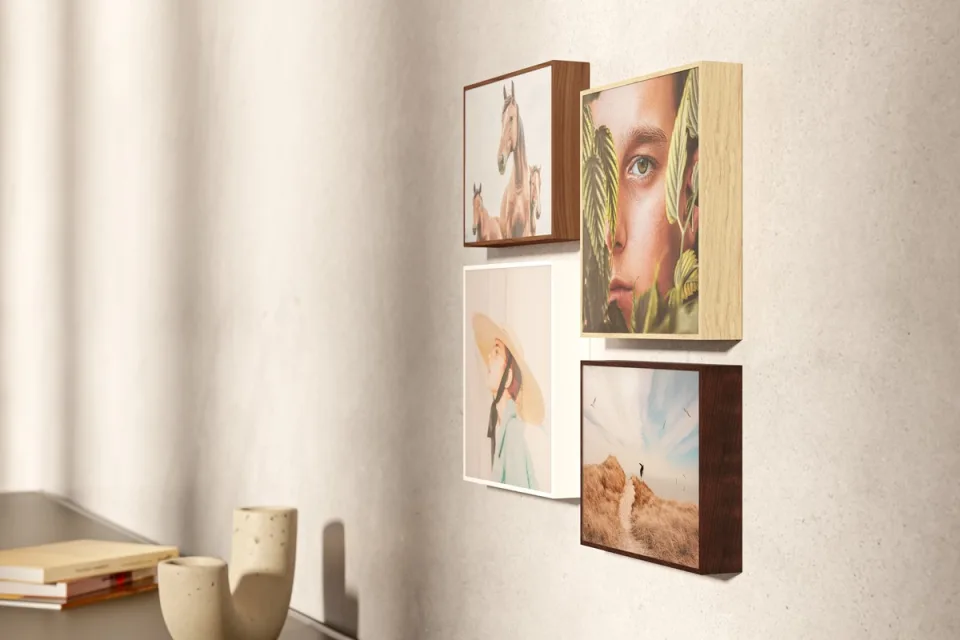 Hanging arrangement of four ArtBoxes above a sideboard.