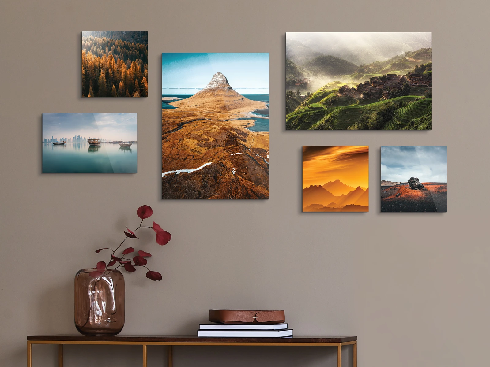 Several different motifs on Original Photo Prints On Wood on a wall in a living room.