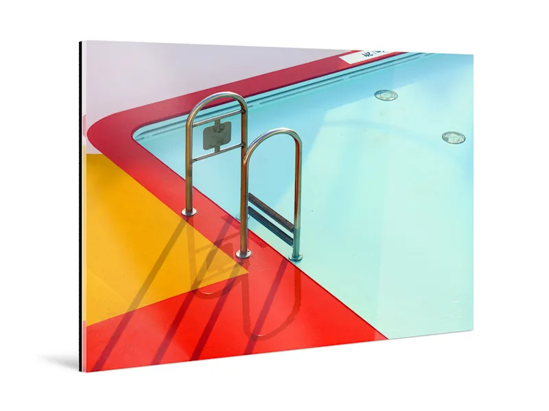 Colourful fine art print under acrylic glass standing.