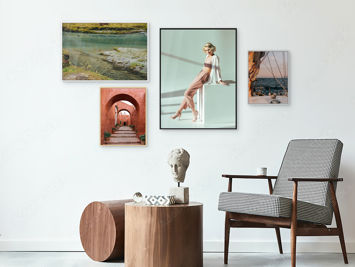 Several different motifs on Acrylic Prints With Slimline Cases on a wall in a living room.
