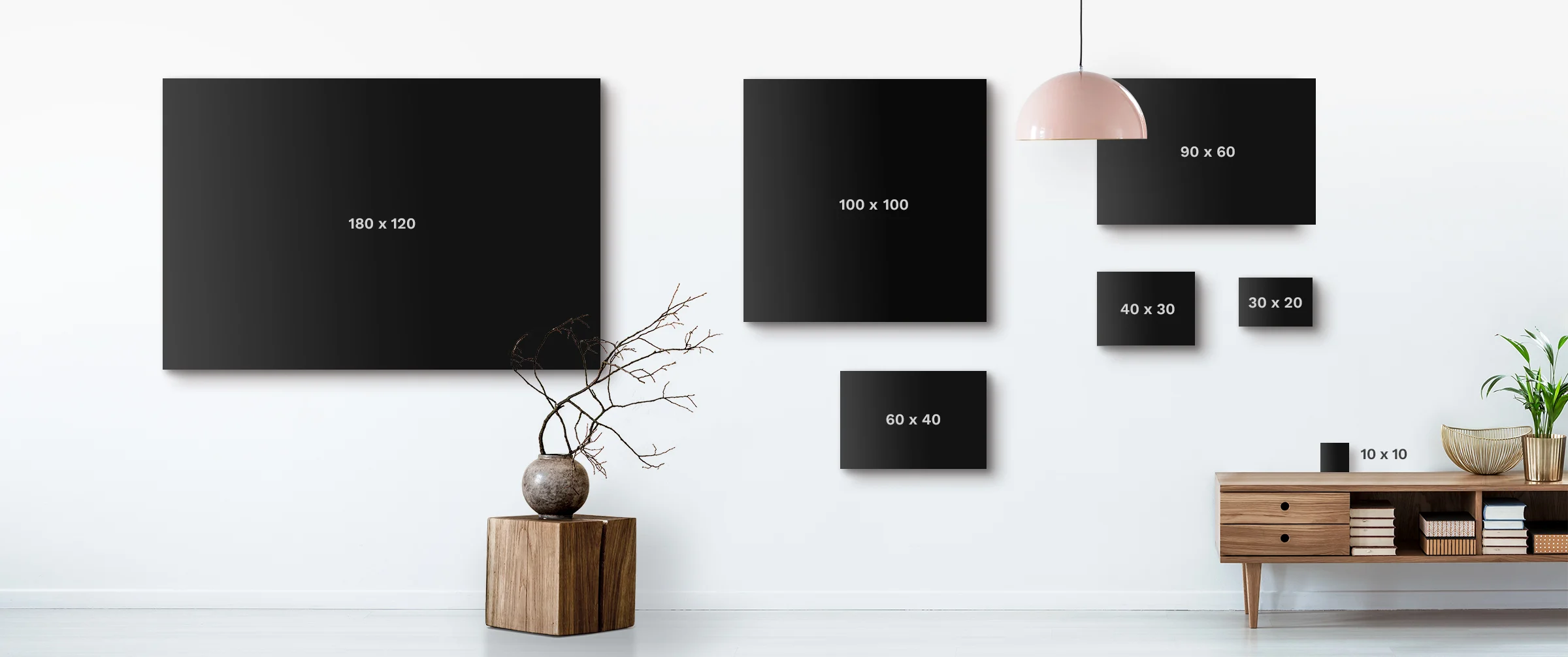 Size comparison graphic of several photo print formats on the wall.