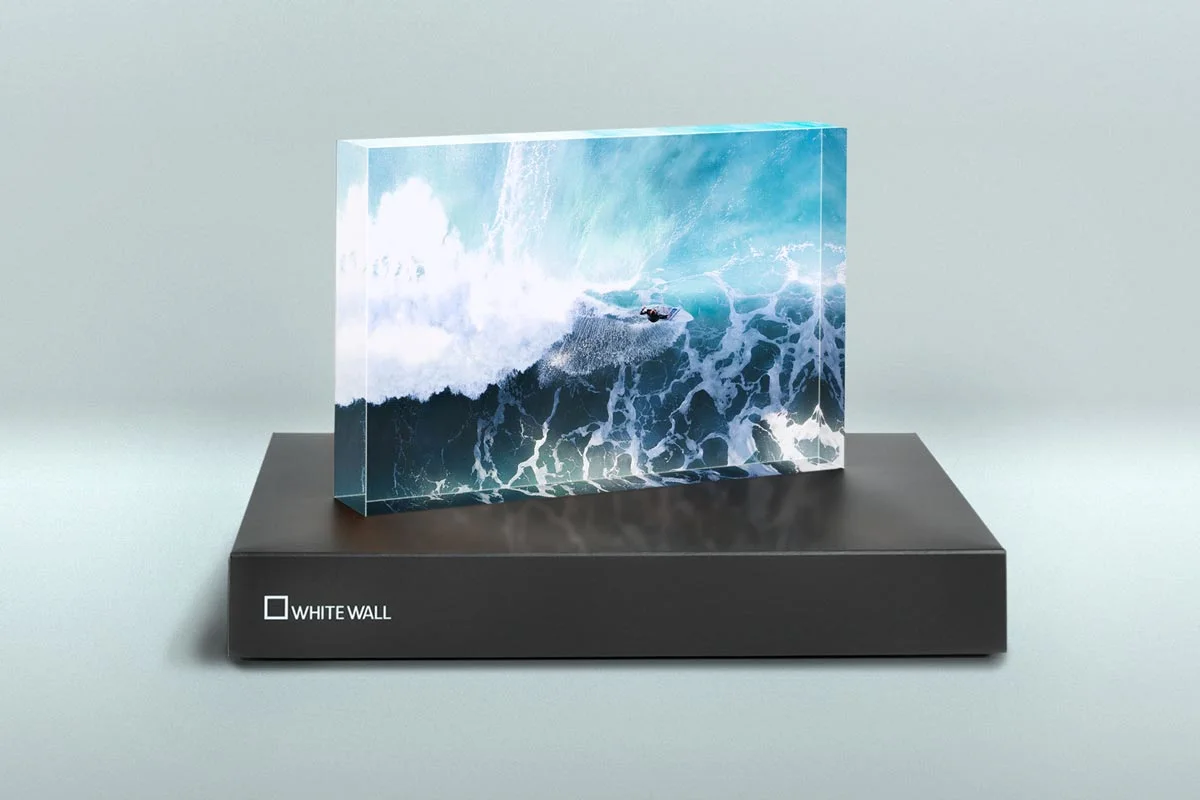 ArtBox with a picture of a surfer on turquoise waves, presented on a black WhiteWall box.