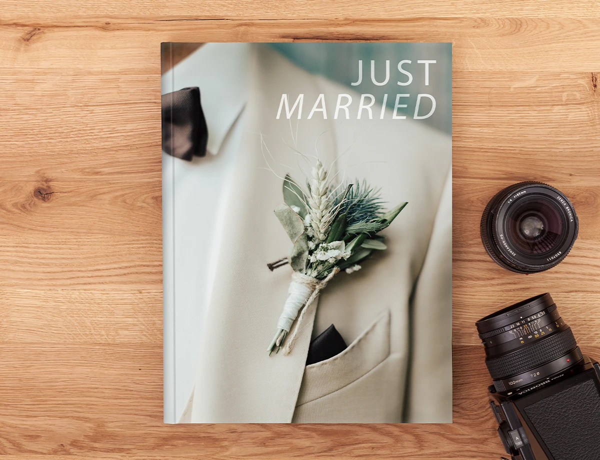 Cover image of a wedding album coffee table book.