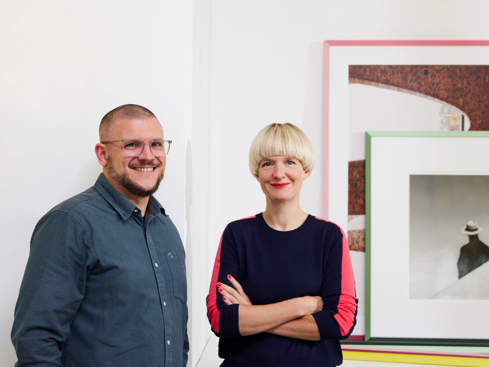 Image of the designers Eva Marguerre and Marcel Besau, standing next to each other.