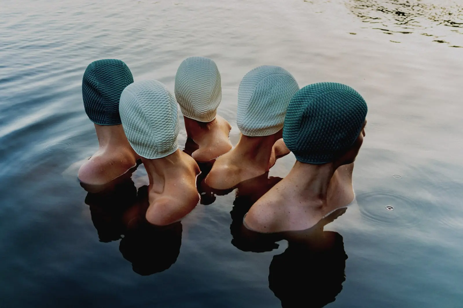 Women with swimming caps.