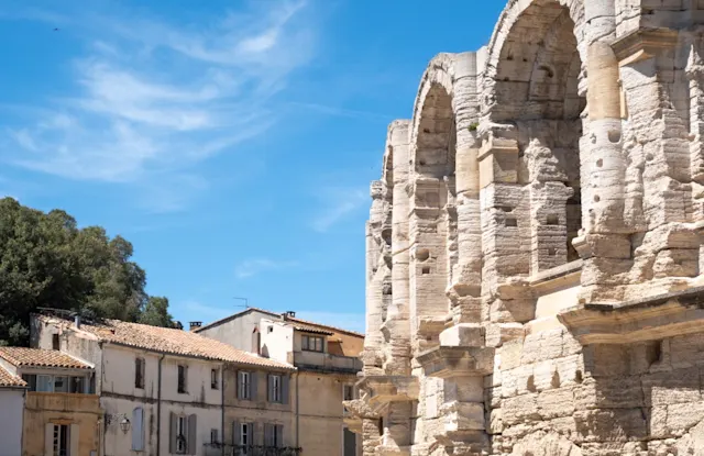 roman amphitheatre with blue sky in the background