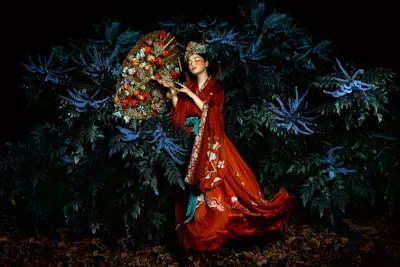 atmospheric portrait photo of a woman in traditional robes.