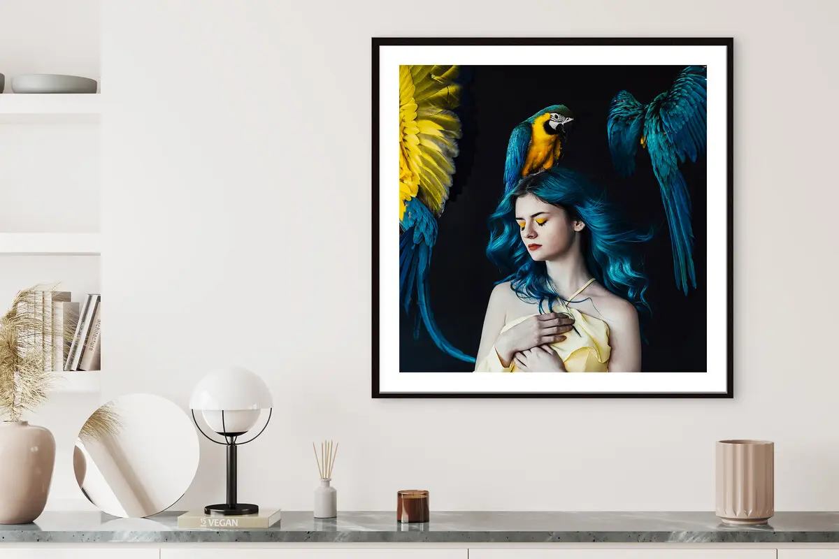 Surreal fine art portrait with blue and yellow tones, composition with blue-and-yellow macaw sitting on head and flying out of sight.
