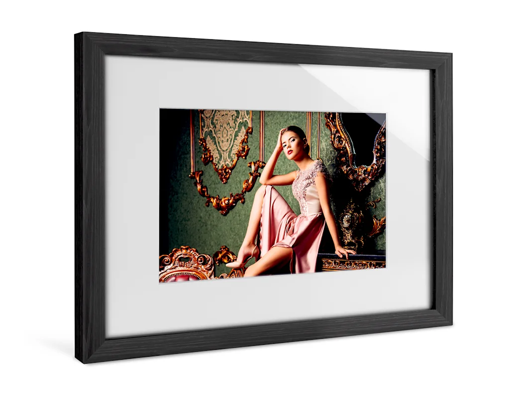 A woman has her portrait taken on a chest of drawers in a Solid Wood Frame With Passe-Partout.