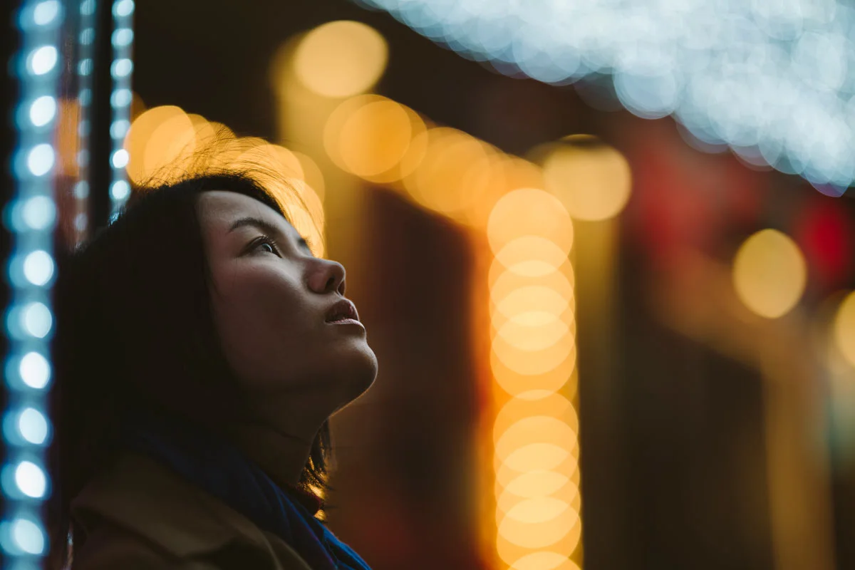 woman and street lights.