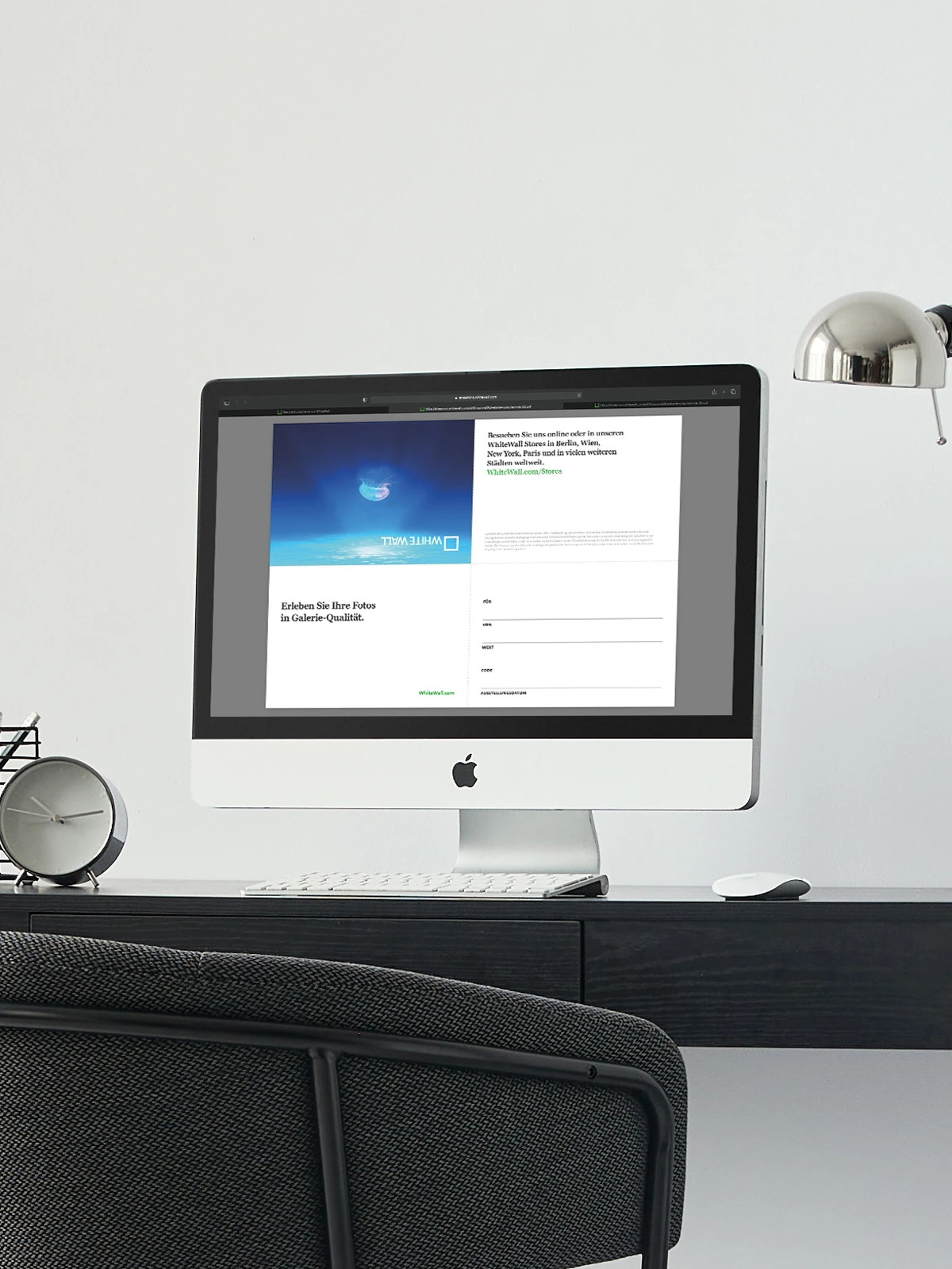 desktop pc with the digital whitewall gift certificate displayed on the monitor.