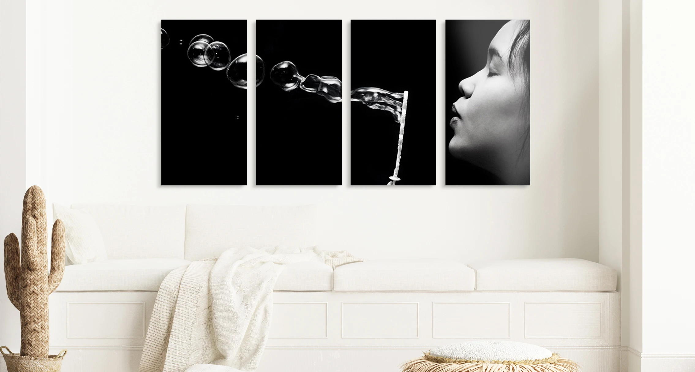 A woman is blowing soap bubbles. The whole picture is divided into four parts hanging horizontally on the wall. 