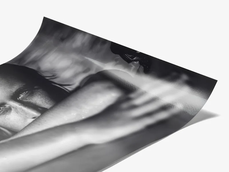 Photo print on baryta paper with a black-and-white photograph of a person