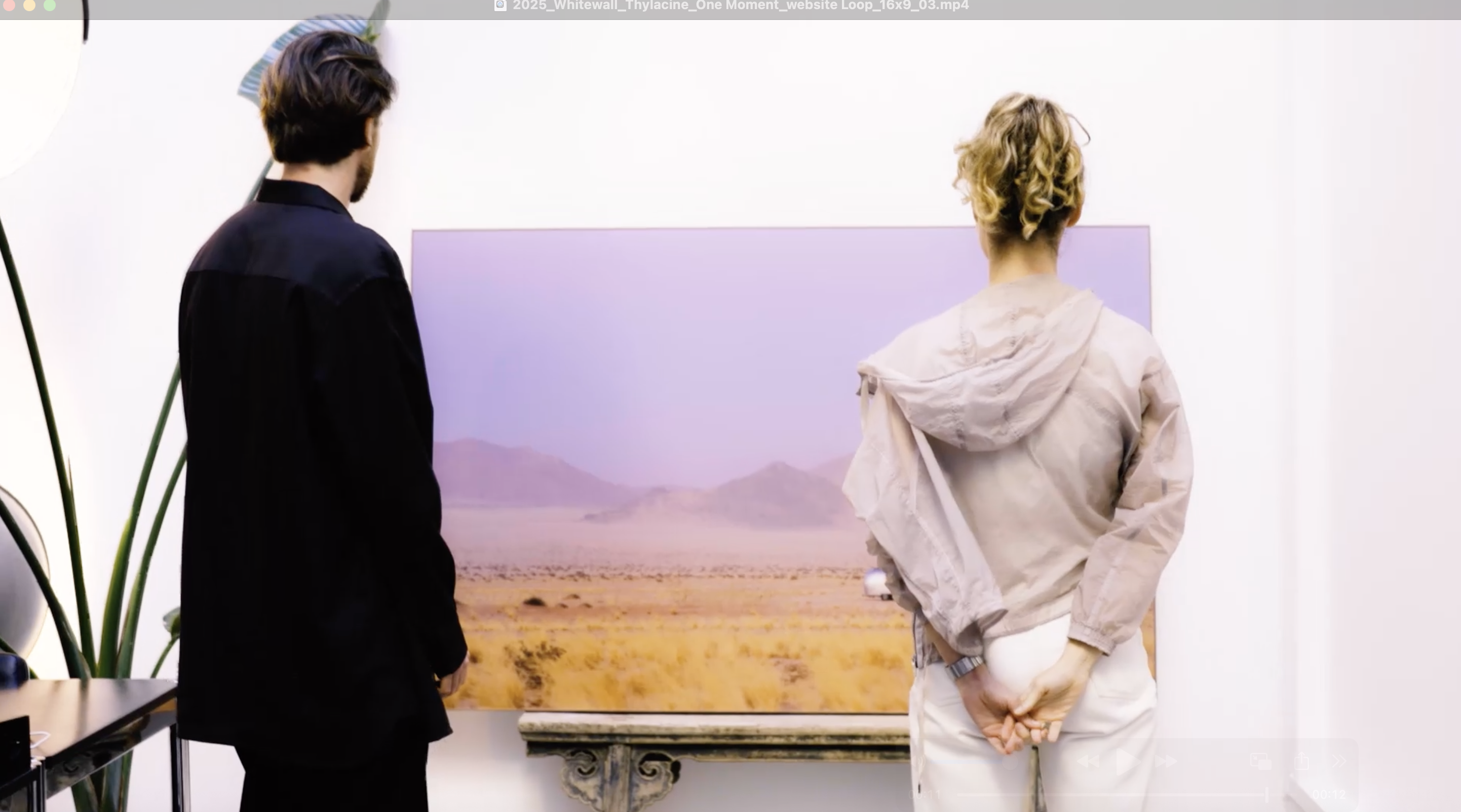 Thylacine and Cécile Chabert viewing their finished WhiteWall wall art