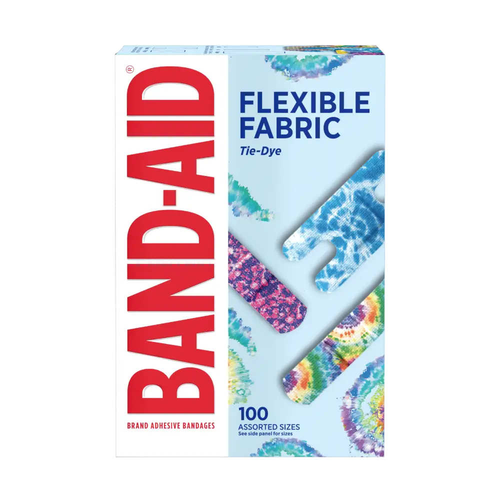 A box of 100 Band-Aid Brand adhesive bandages. The bandages are flexible fabric with a tie-dye pattern in assorted colors and sizes