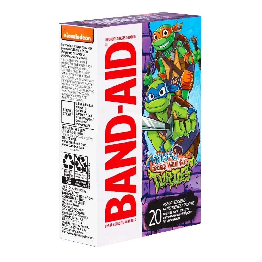 A box of Band-Aid brand adhesive bandages featuring Teenage Mutant Ninja Turtles artwork. The box is purple and features the TMNT characters prominently. The text indicates the bandages are assorted sizes and sterile. The Nickelodeon logo is also visible.
